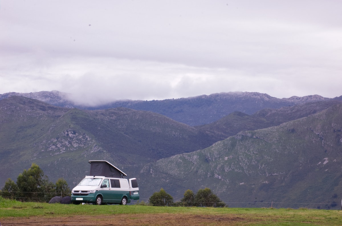 Motorhome parked on a grass pitch